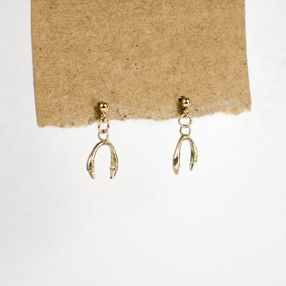 Solid reclaimed 10k gold horseshoe charms and jump-rings dangling from gold-filled studs handmade and finished in our Catskills store-studio and available as singles to mix-and-match.