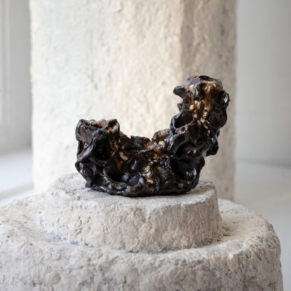 Unique 3 x 5 x 3 inch hand-built Zanzibar clay double candelabra with white crawl and clear glazes by Bobbi Salvör Menuez.