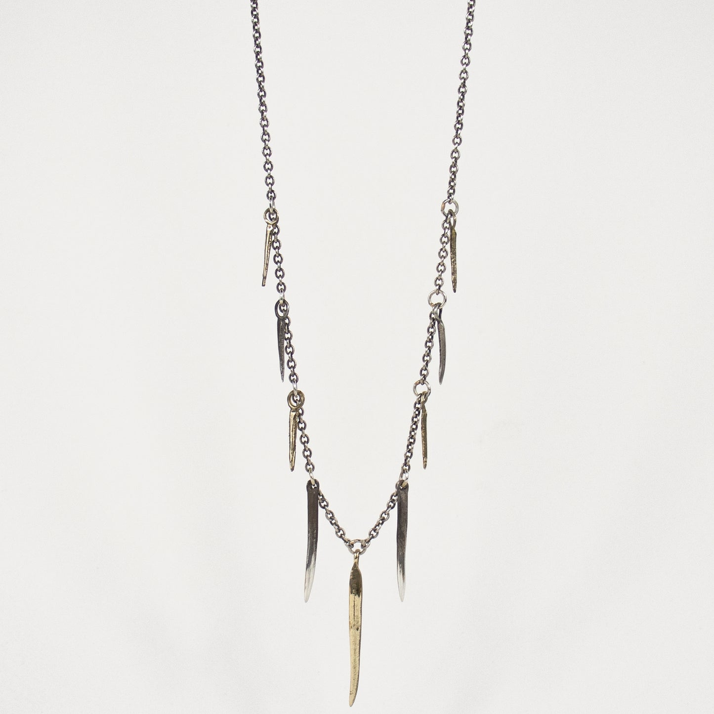 Solid reclaimed sterling silver and brass mixed-size spikes on sterling cable-chain adjustable 16 - 20  inches handmade and finished in our Catskills store-studio.