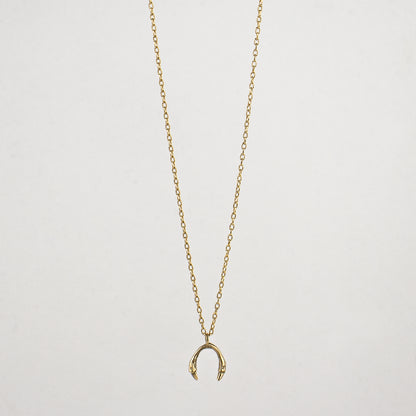 Tiny horseshoe pendant measuring 0.25" available in Solid reclaimed 10k gold or sterling silver tiny 0.25 inch horseshoe pendant on 18 inch gold-filled or sterling fine-chain handmade and finished in our Catskills store-studio.