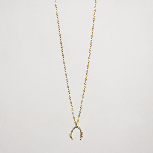 Tiny horseshoe pendant measuring 0.25" available in Solid reclaimed 10k gold or sterling silver tiny 0.25 inch horseshoe pendant on 18 inch gold-filled or sterling fine-chain handmade and finished in our Catskills store-studio.