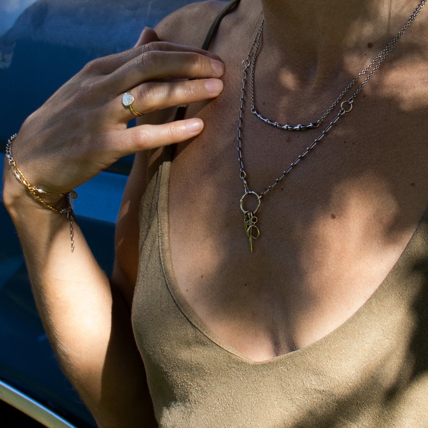 Small solid reclaimed sterling silver or brass 2 inch spine on sterling cable-chain adjustable 16 - 20 inches handmade and finished in our Catskills store-studio shown on model.