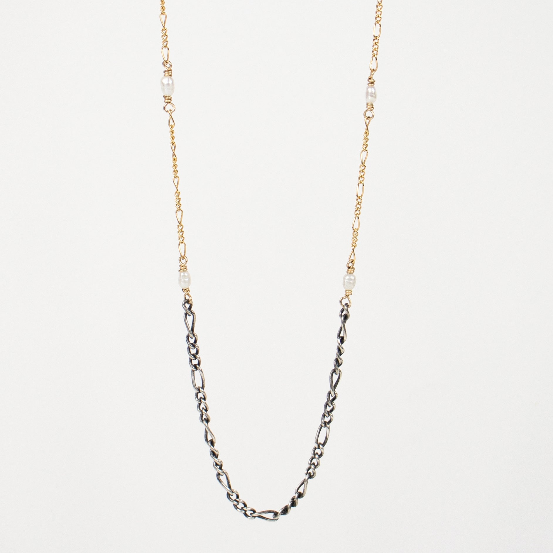 Reclaimed sterling silver and gold-filled mixed Figaro chains hand-beaded with 2 mm white rice pearls adjustable 16 - 20 inches and handmade and finished in our Catskills store-studio.