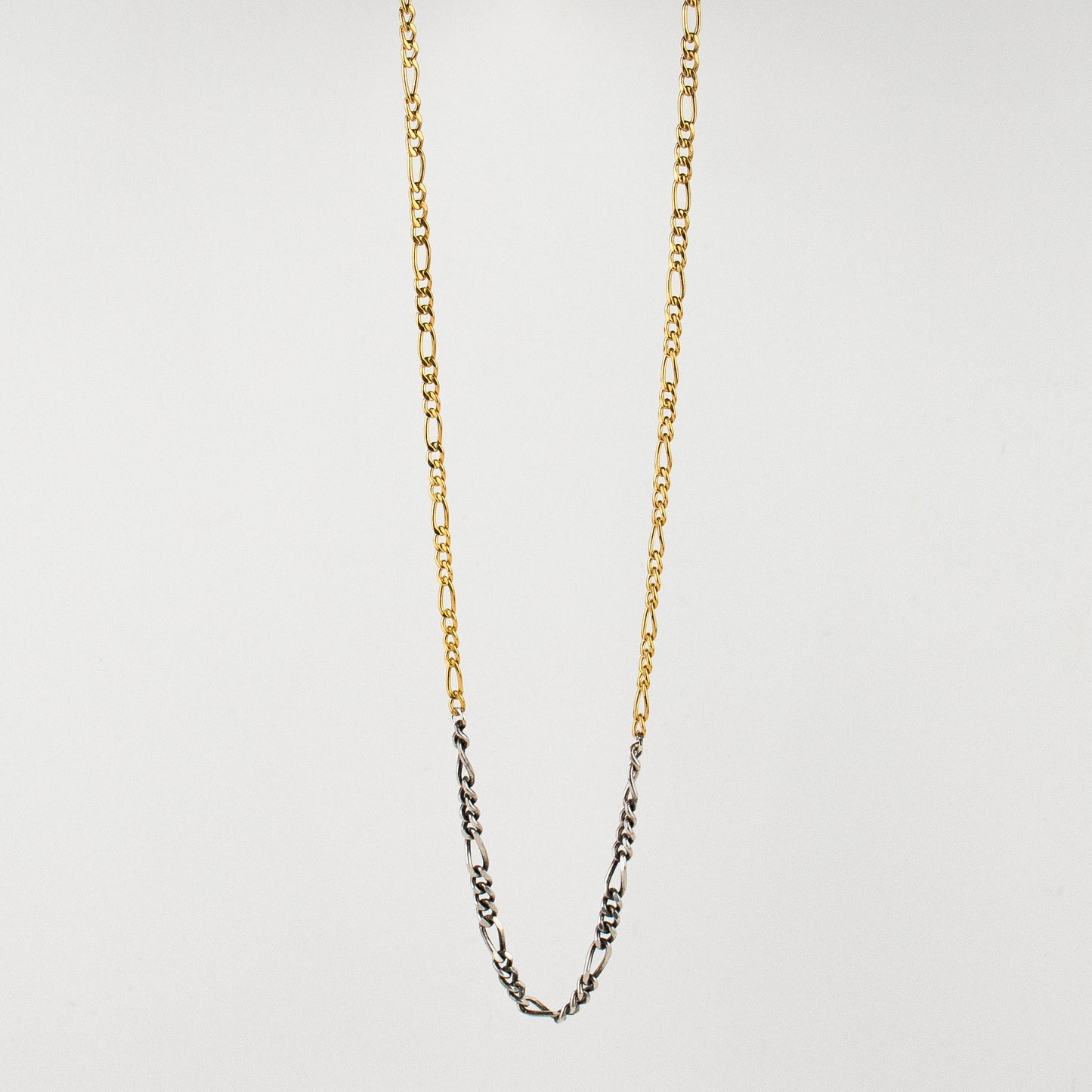 Reclaimed sterling silver and gold-filled mixed-size Figaro chains adjustable 18 - 22 inches and handmade and finished in our Catskills store-studio.