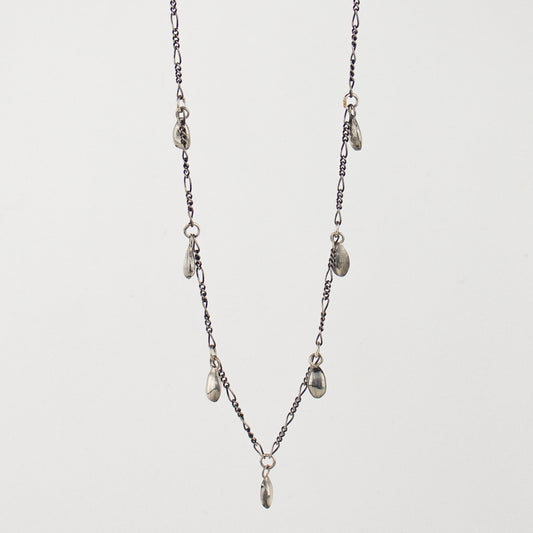 Seven solid reclaimed sterling silver seeds on sterling Figaro chain adjustable 16 - 20 inches and handmade and finished in our Catskills store-studio.