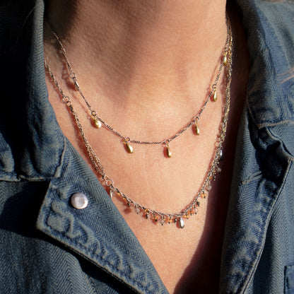 Three solid reclaimed sterling silver seeds hand-beaded with a citrine, labradorite, and pyrite beaded fringe on sterling and gold-filled tangled mixed-chain adjustable 22 - 26 inches handmade and finished in our Catskills store-studio shown on model.