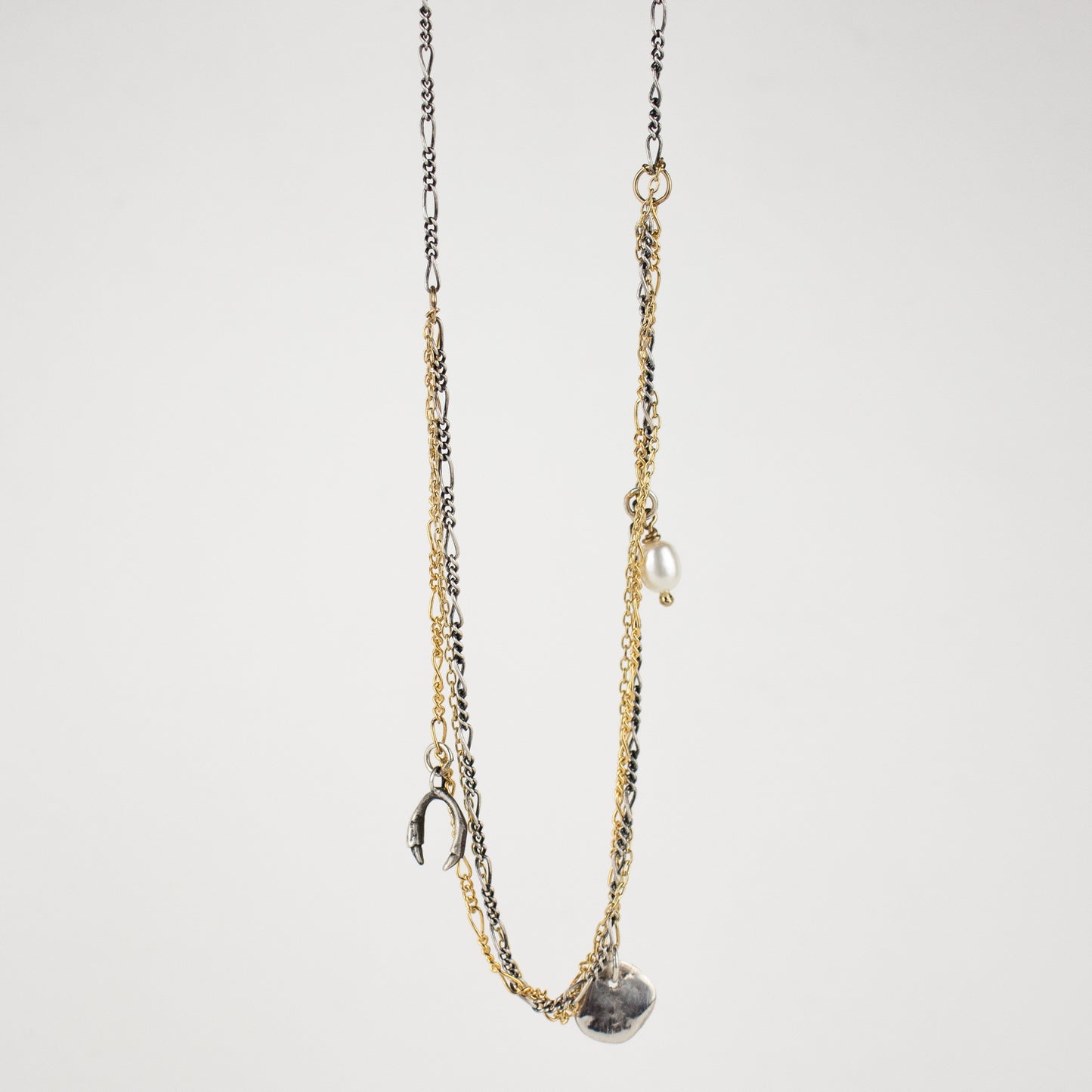 Two solid reclaimed sterling silver horseshoe and rock charms with freshwater pearl on tangled sterling and gold-filled chain adjustable 16 - 20 inches handmade and finished in our Catskills store-studio.