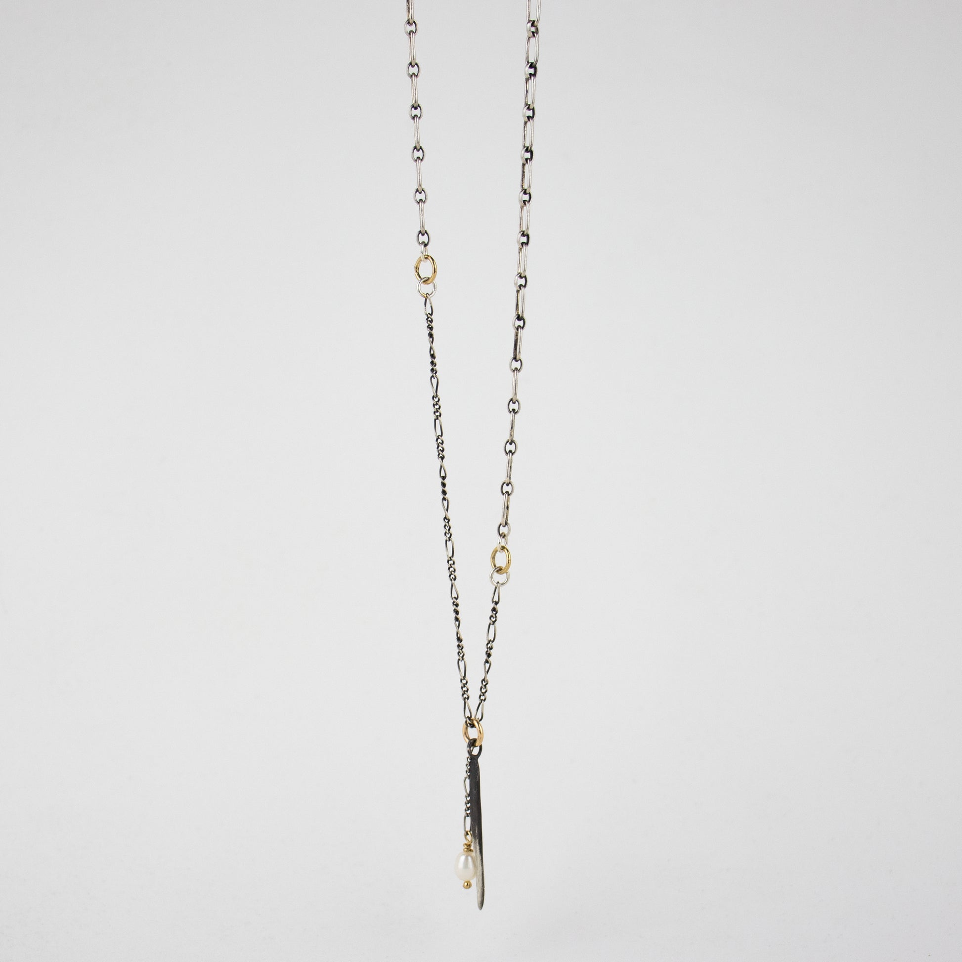 Solid reclaimed partially oxidized sterling silver spike and freshwater pearl on sterling mixed-chain adjustable 16-20 inches handmade and finished in our Catskills store-studio.