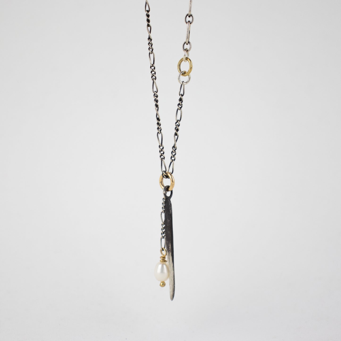 Solid reclaimed partially oxidized sterling silver spike and freshwater pearl on sterling mixed-chain adjustable 16-20 inches handmade and finished in our Catskills store-studio.