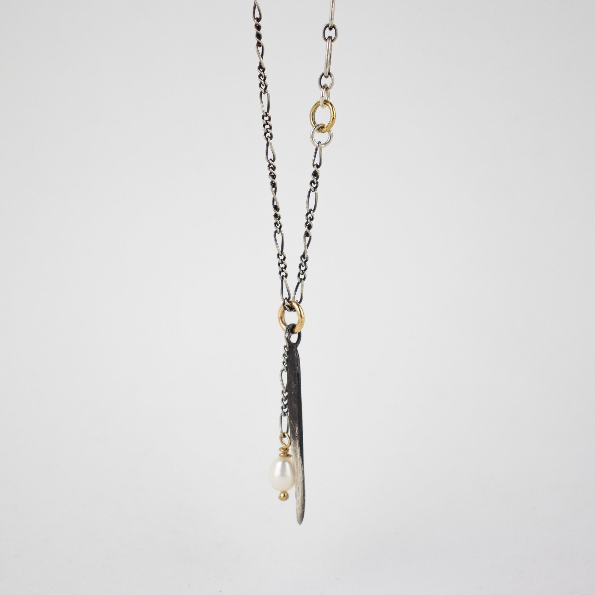 Solid reclaimed partially oxidized sterling silver spike and freshwater pearl on sterling mixed-chain adjustable 16-20 inches handmade and finished in our Catskills store-studio.