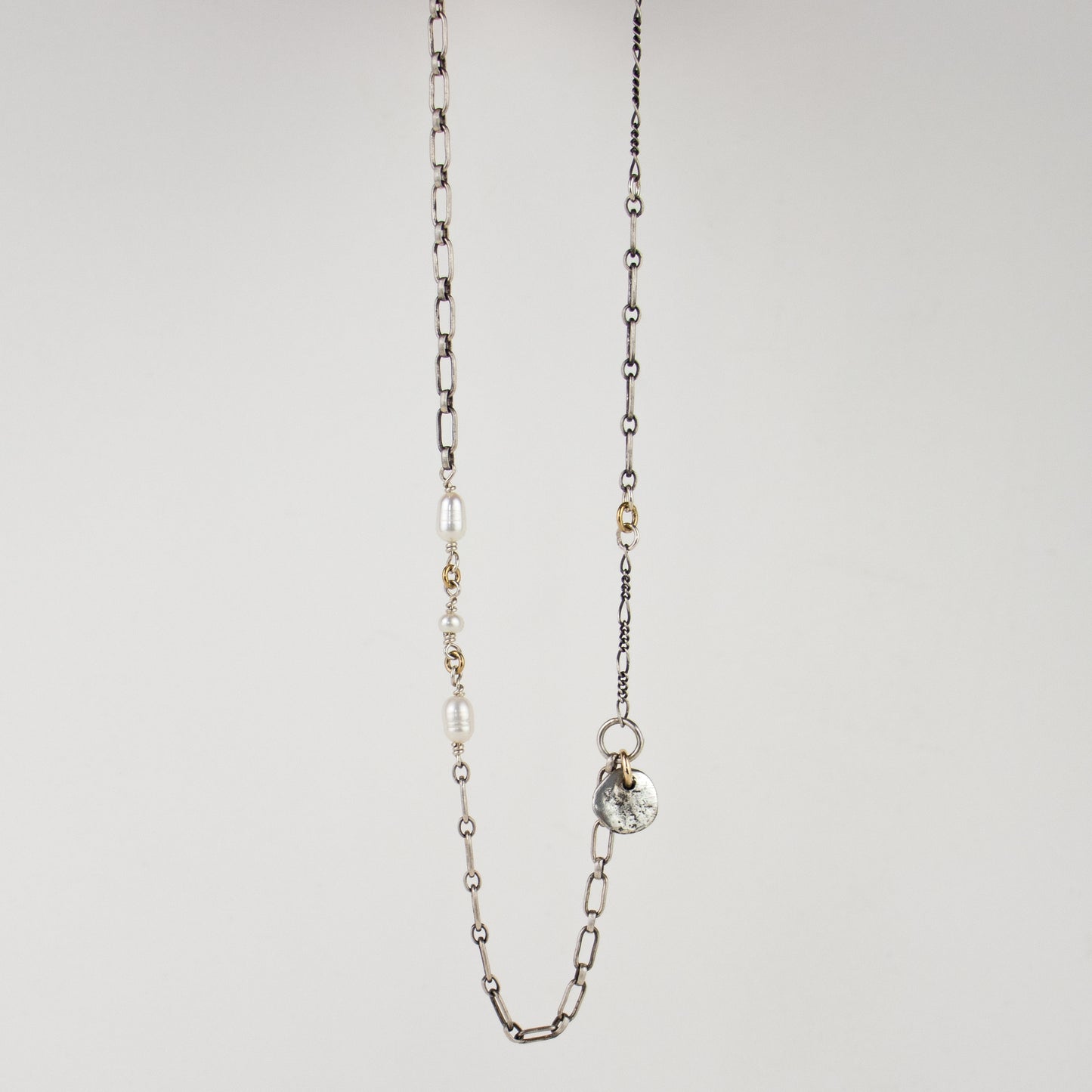 Solid reclaimed sterling silver rock charm on sterling mixed-chain hand-beaded with three freshwater pearls adjustable 16 - 20 inches handmade and finished in our Catskills store-studio.