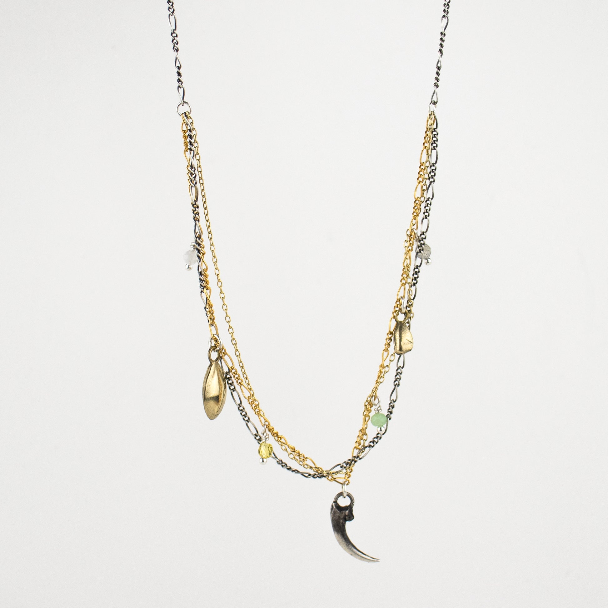 Solid reclaimed sterling silver Icelandic owl claw, two brass seeds, and chrysoprase, moonstone, labradorite and citrine beads on tangled sterling and gold-filled mixed-chains adjustable 16 - 20 inches handmade and finished in our Catskills store-studio.