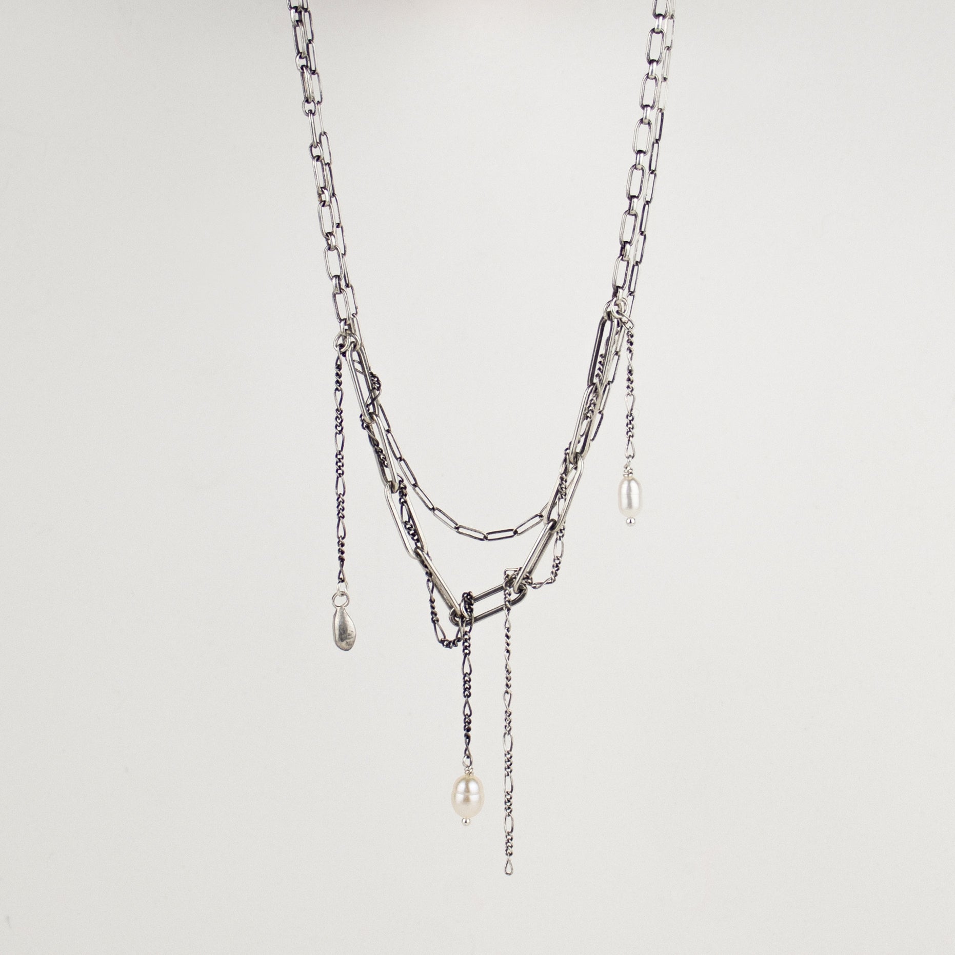 Tangled sterling silver double paperclip chain necklace with solid reclaimed sterling seed and freshwater pearls handmade and finished in our Catskills store-studio.