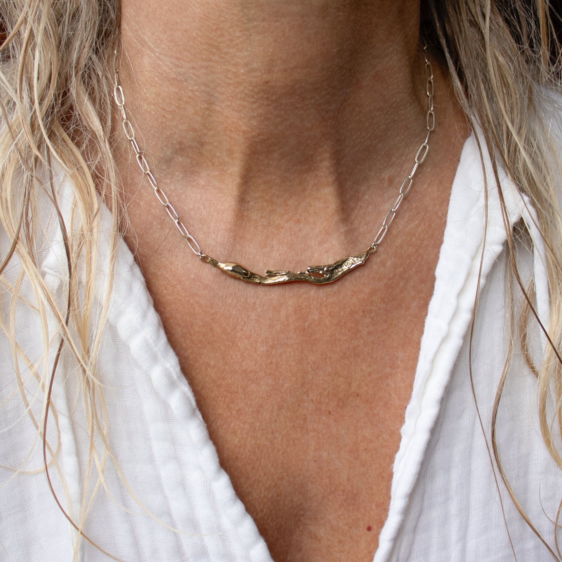 Reclaimed brass 3 inch seaweed feather on sterling silver paperclip chain adjustable 16-18 inches handmade and finished in our Catskills store-studio and shown on model.