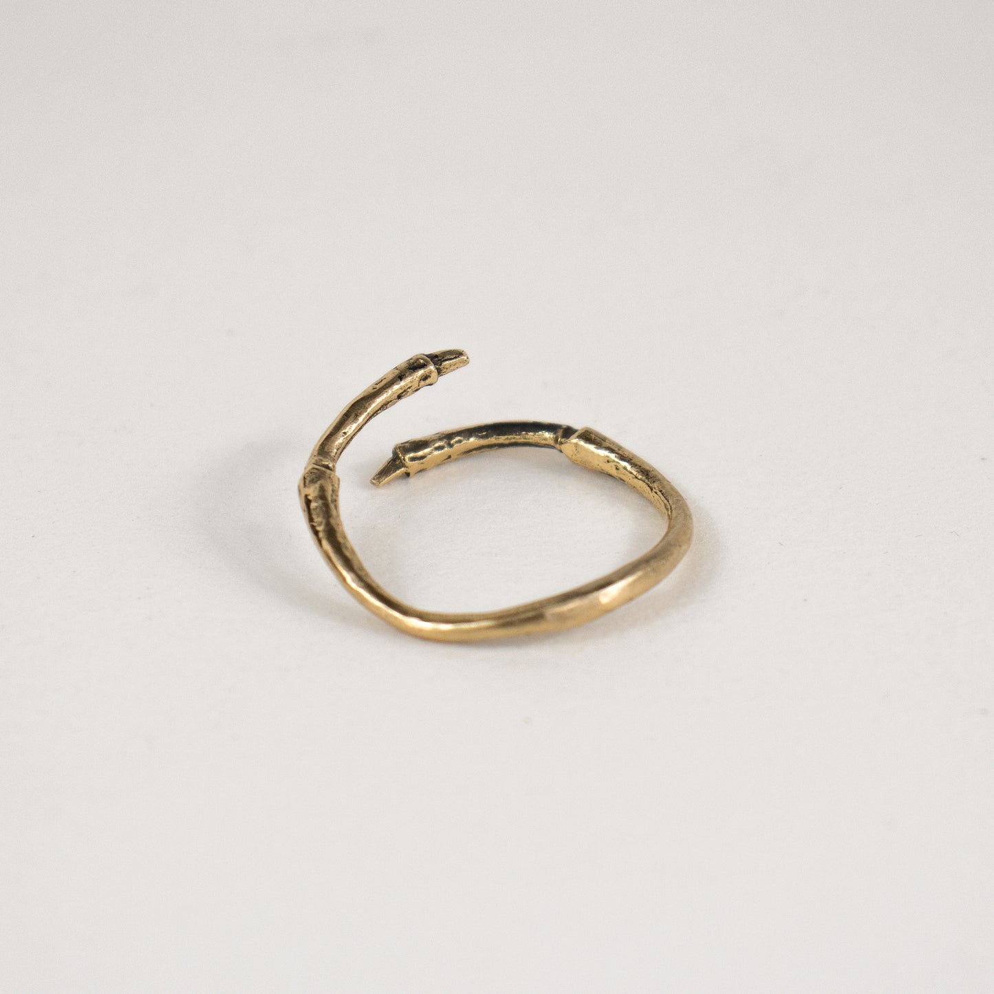 Solid reclaimed 10k gold wraparound branch ring adjustable to sizes 5.5 - 9.5 handmade and finished in our Catskills store-studio by Icelandic designer, Johanna Methusalemsdottir.