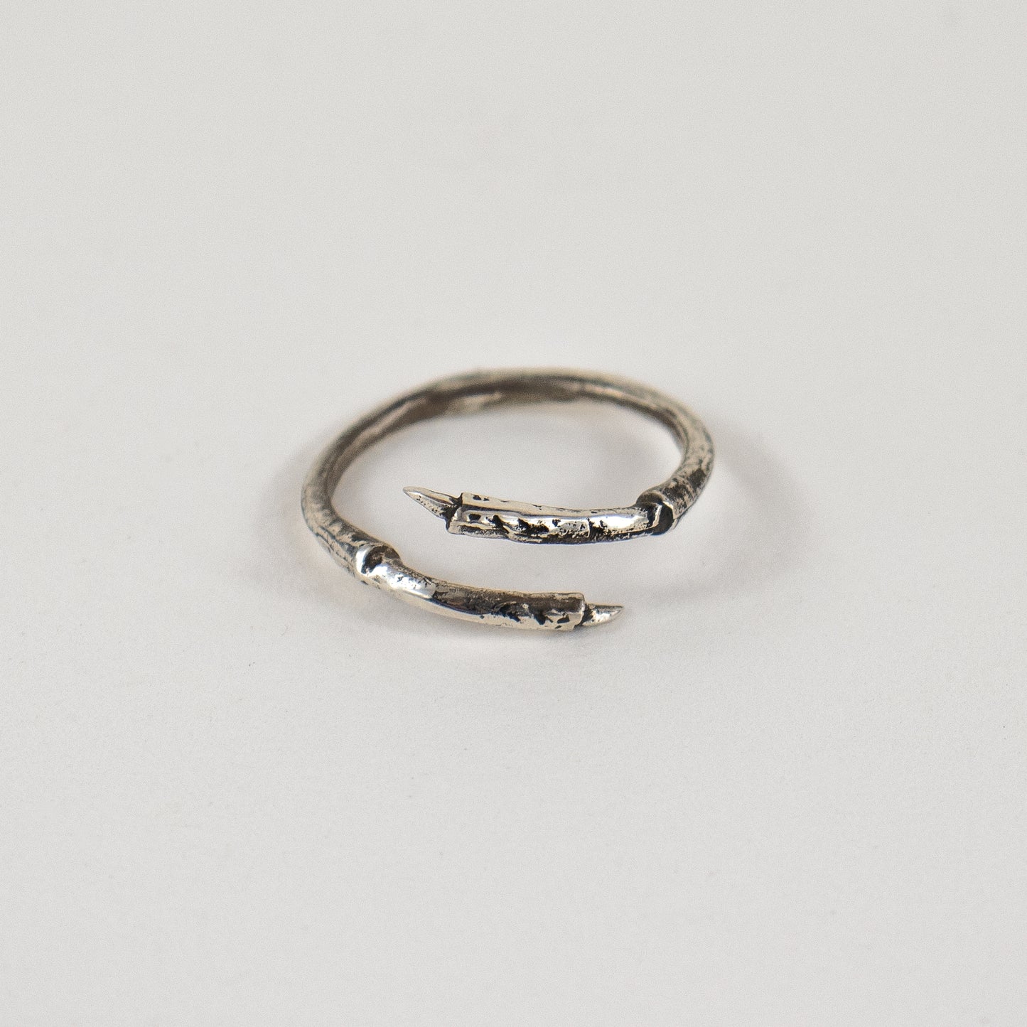 Solid reclaimed sterling silver wraparound branch ring adjustable to sizes 5.5 - 9.5 handmade and finished in our Catskills store-studio by Icelandic designer, Johanna Methusalemsdottir.