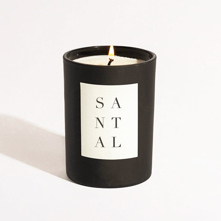 Santal Noir is a sultry masculine blend of earth and woods, Hinoki cypress floats above a rich heart of cedar and pine and a warm base of vetiver and sandalwood. Made in Brooklyn with 100% soy wax and vegan, cruelty-free, phthalate-free, and petroleum-free. 10 ounces and burns up to 70 hours and available at Kria World in the Catskill Mountains.