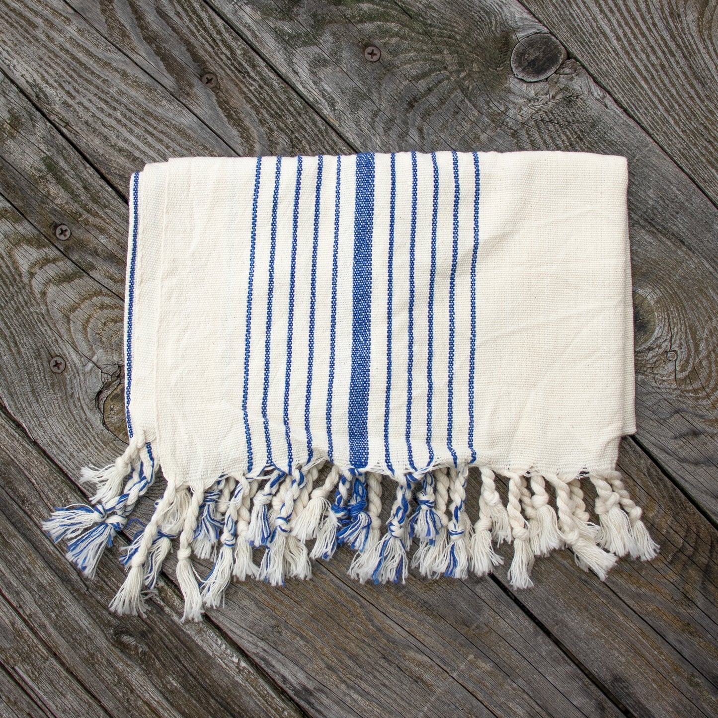 100% premium Turkish cotton hand towels—highly absorbent, lightweight, quick to dry, and perfect for the kitchen or bath. 17 x 25 inches overall hand-loomed and hand-dyed by Turkish artisans for woman-owned Home & Loft of New York.
