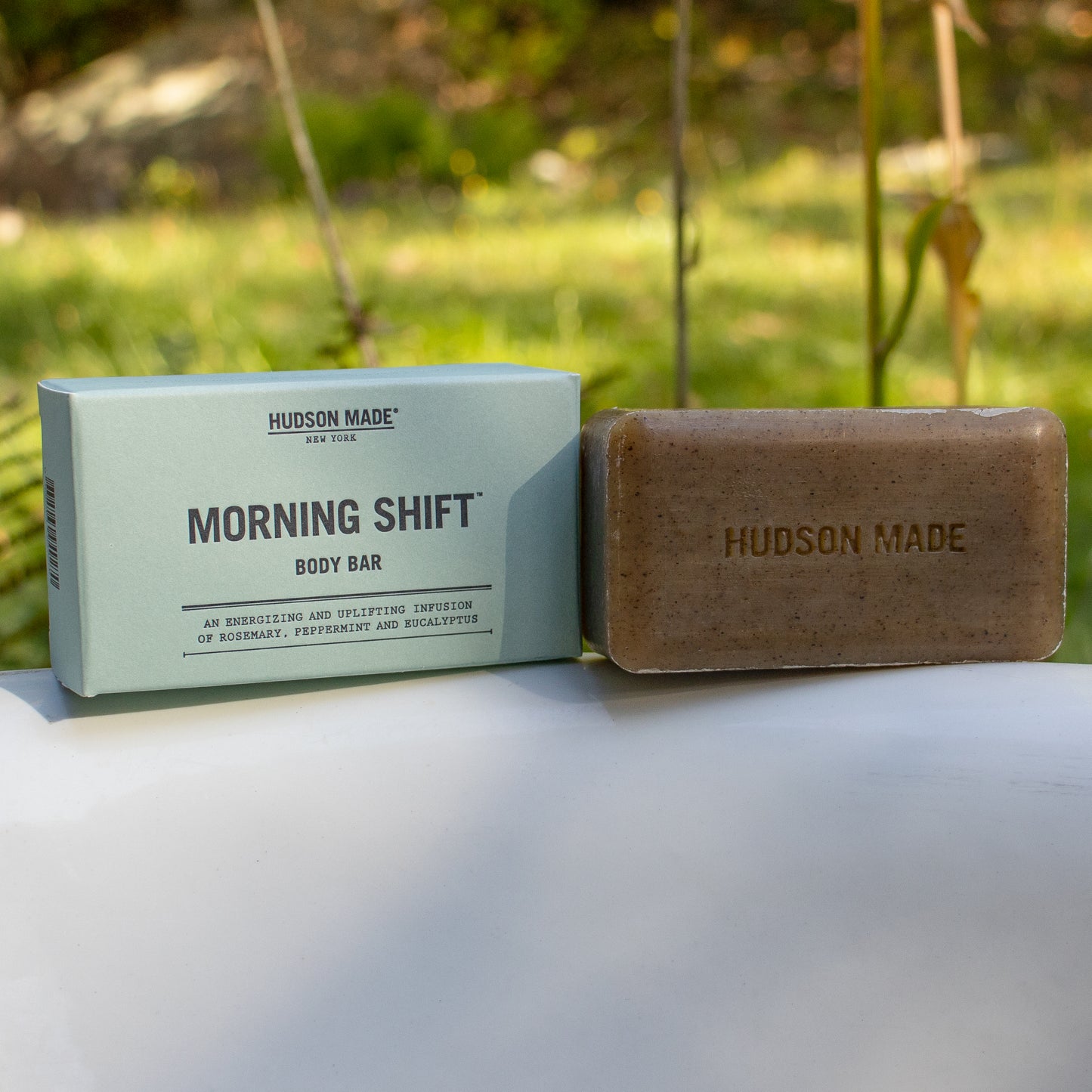 Jump-start your day and enjoy the nourishing effects of shea butter and jojoba oil, which both heal, moisturize, and deliver antioxidants to your skin. Breathe easy as pure rosemary and eucalyptus oils stir the senses and peppermint awakens your skin with a tingle. Vegan and palm oil free 5.75 oz bar in a letter-pressed box.