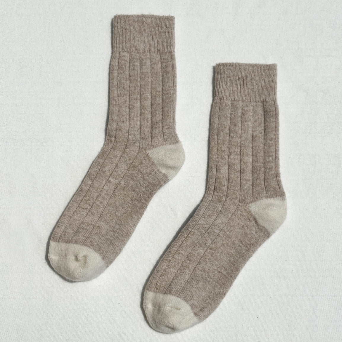 Le Bon Shoppe Classic Cashmere Socks are blended featuring wide ribbing detail, tonal contrasting heel and toe and available in Fawn and Rose Petal.